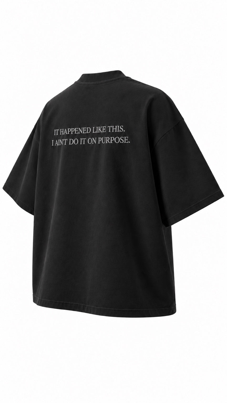 Project MJS black oversized statement tee, alternate rear three-quarter angle