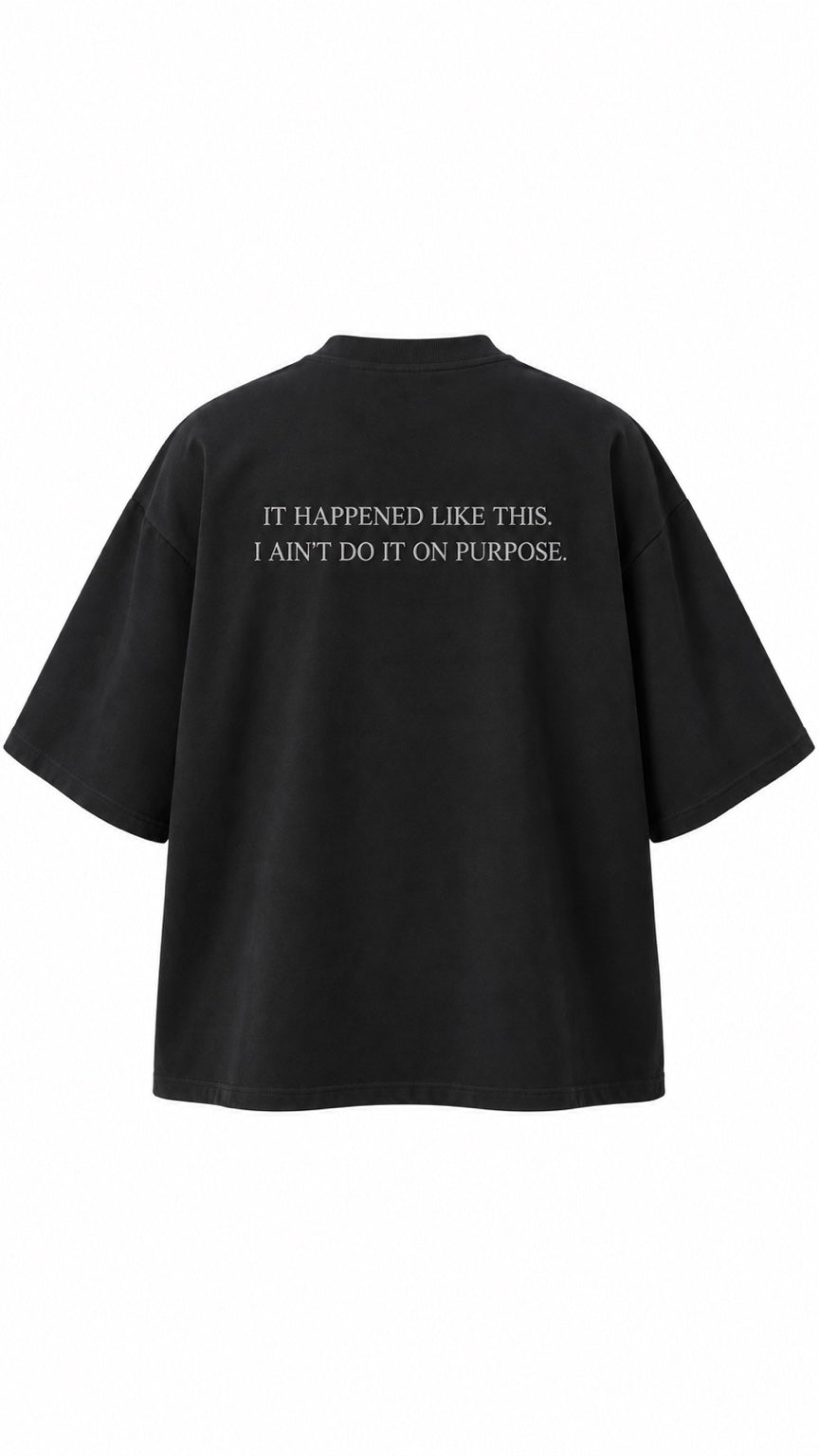 Project MJS black oversized statement tee, back view with statement graphic