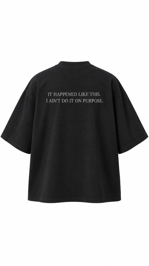 Project MJS black oversized statement tee, back view with statement graphic