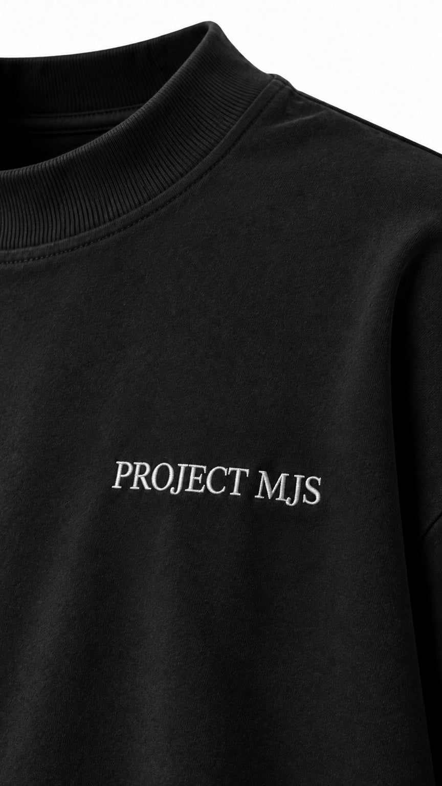 Project MJS black oversized statement tee, chest logo and collar detail